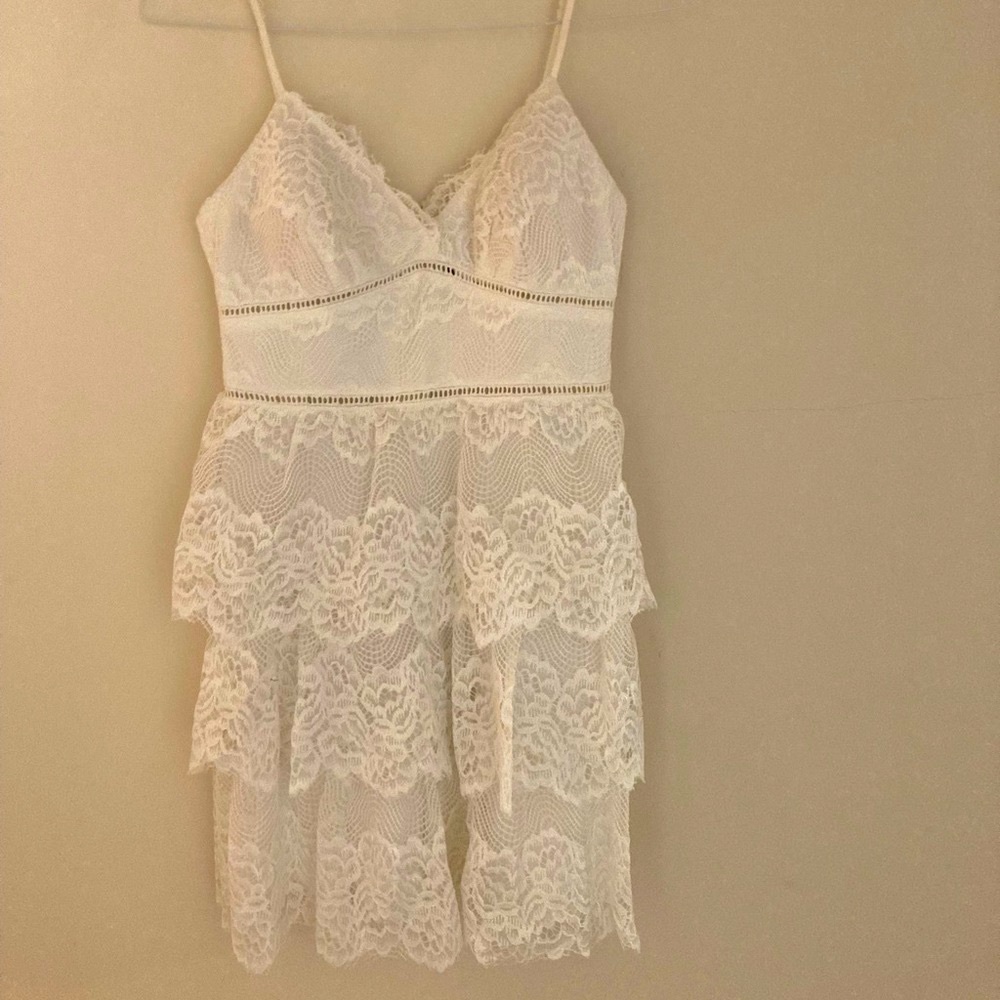 Cute white dress for a party or event, the size is a 7/8.